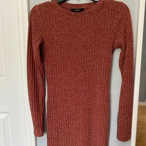 A dress that comes up beneath the knees